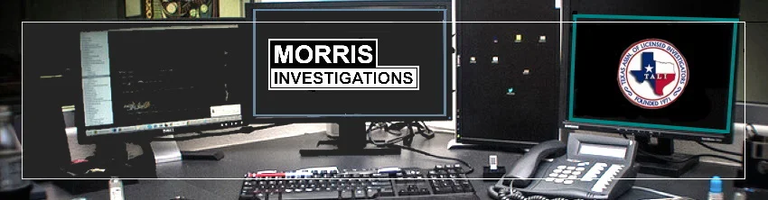PI desk with computers and phone showing how background checks Houston TX are completed.